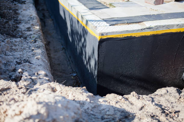 Professional Emergency Waterproofing technician working in Christiansburg, OH